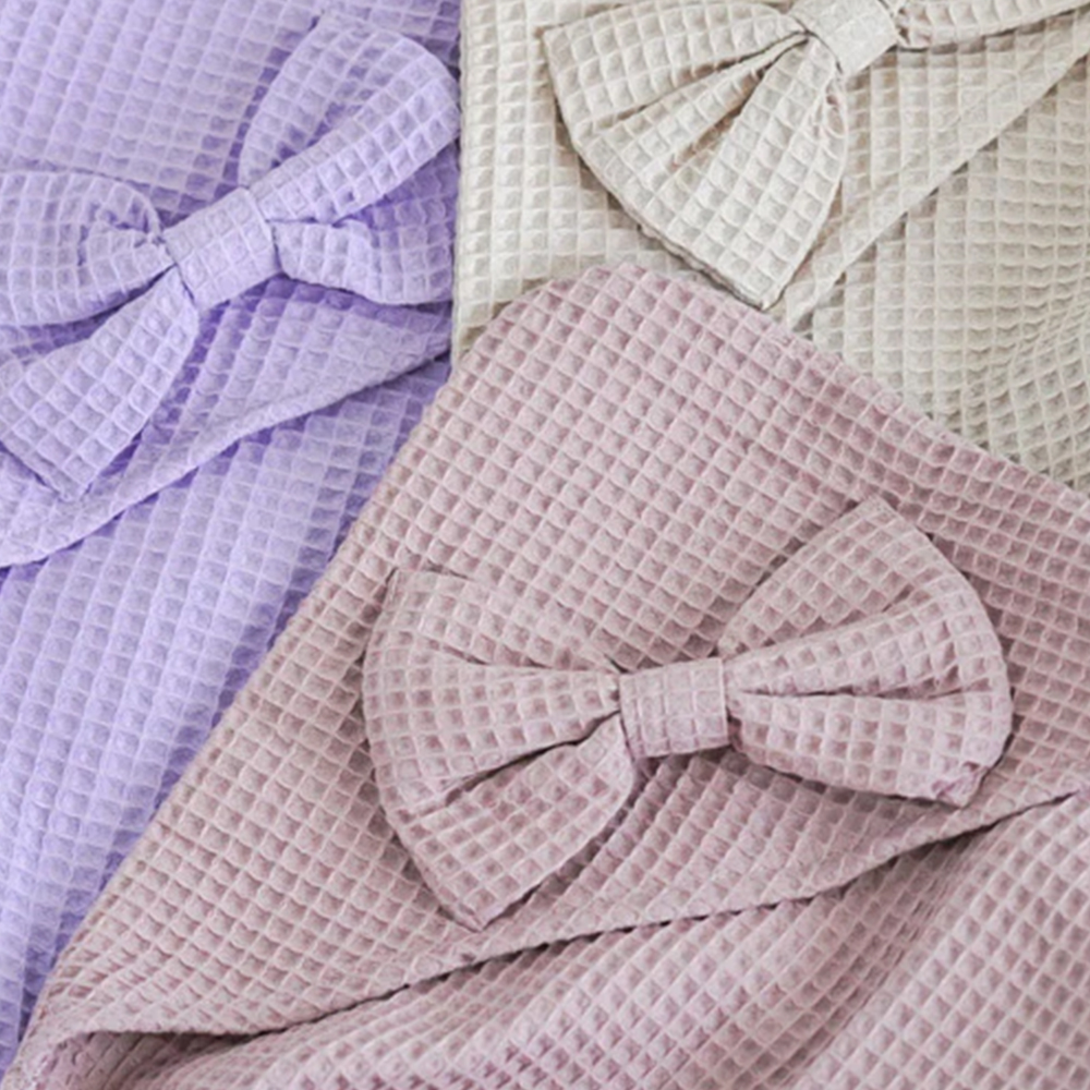 Pastel waffle knit infant towels with bow detail for international ODM and private label projects