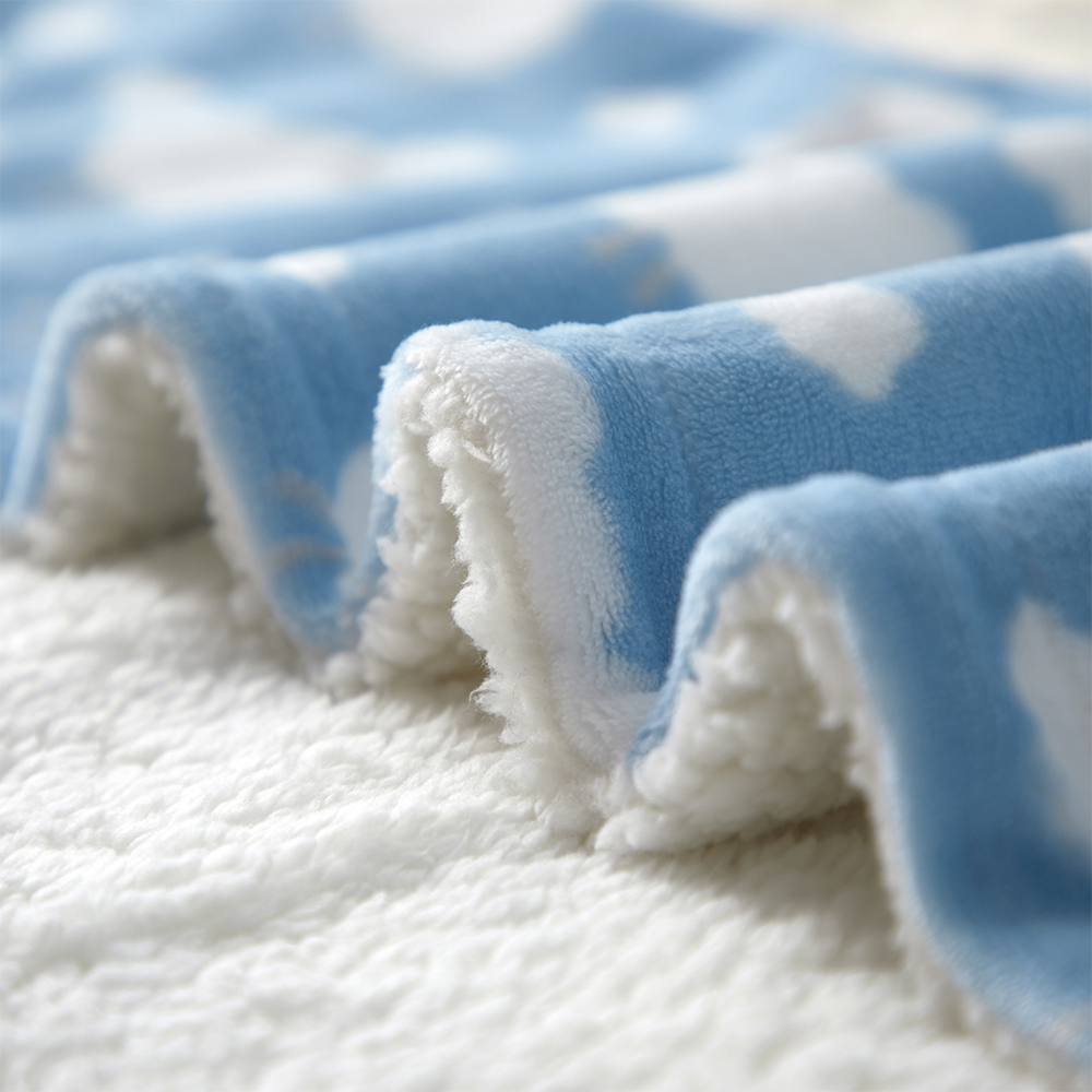 Custom celestial cloud print plush throw curated for private label baby bedding brands