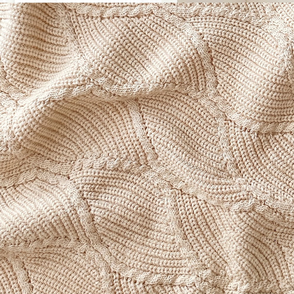 Soft textured knit infant blanket produced by specialized baby bedding factory