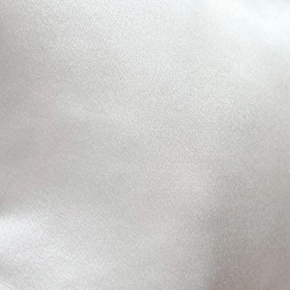 Close-up of Premium Silk Fabric for Kids Cushions - Compliant Private Label Manufacturer